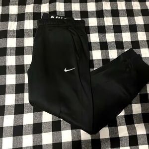 A pair of median Nike therma-fit sweatpants.
